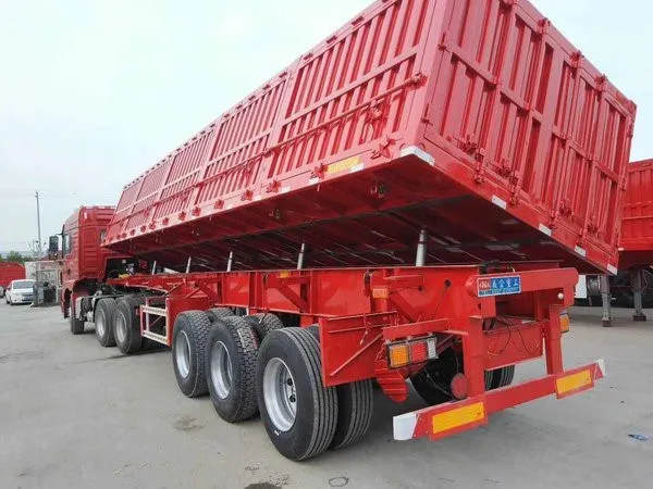 a red side dumping trailer a red side dumping trailer